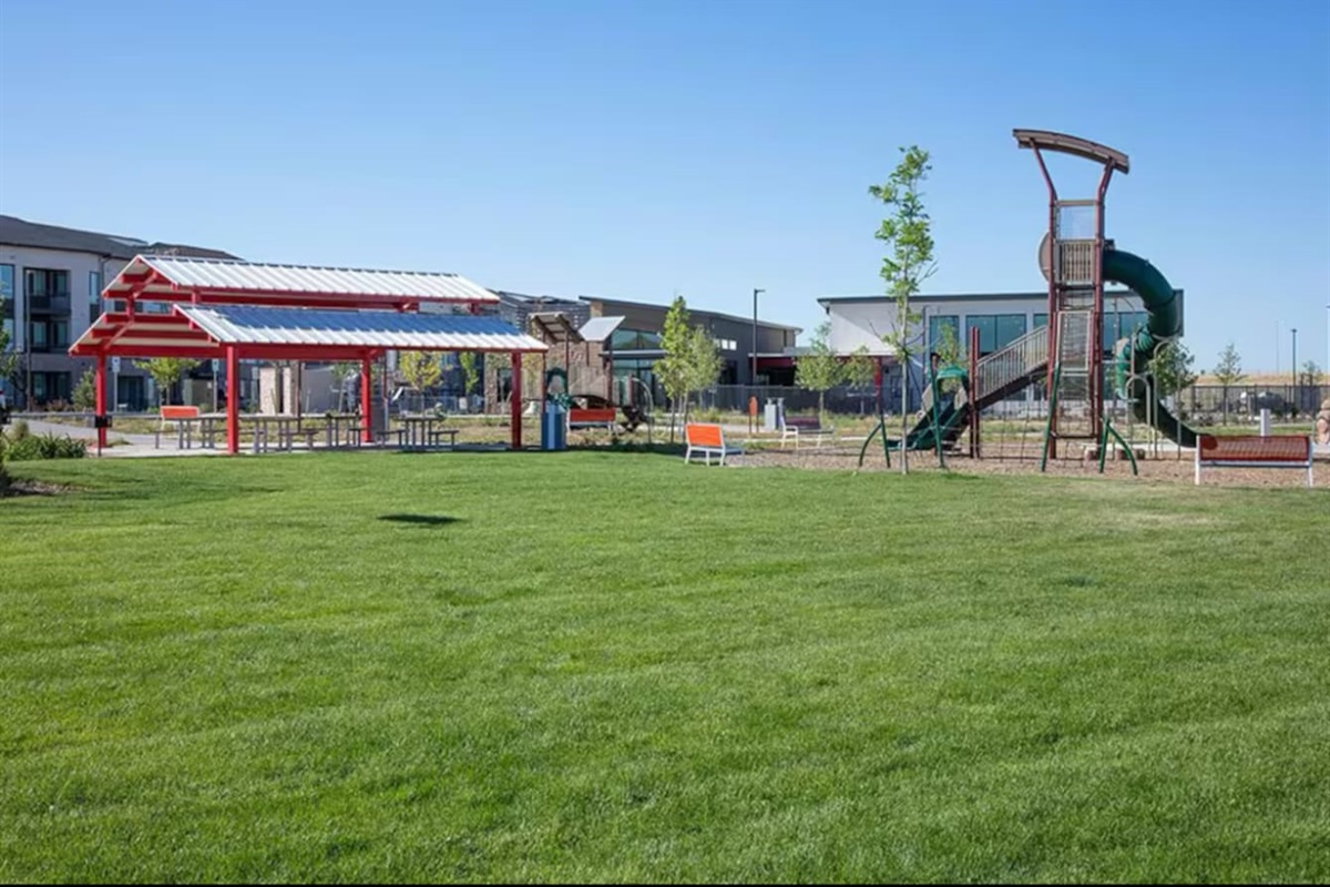 Our community playground, just a minute away, is a child's paradise with a slide, a jungle gym, and plenty of space to run on the large grassy area. 