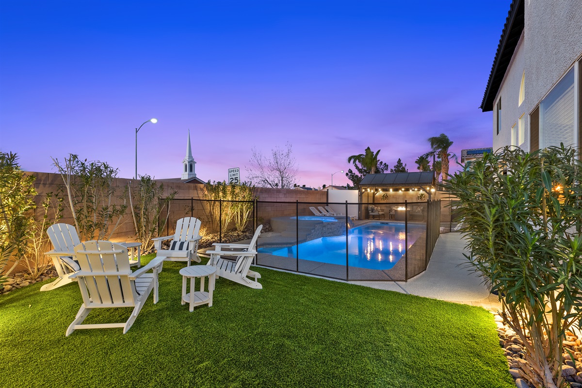 Intimate conversations can be had on our group of Adirondack chairs tucked away on our grass yard. -It's Showtime!
