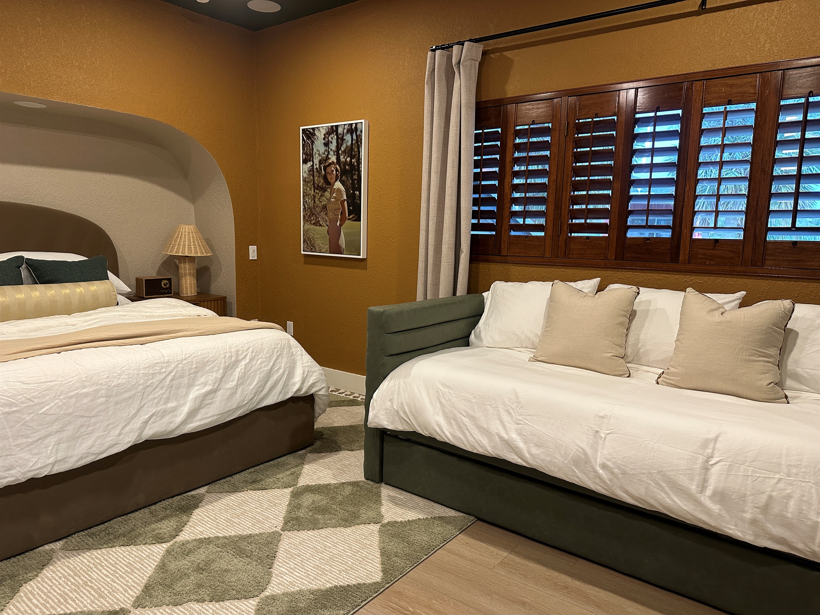 This additional twin day bed+trundle provides an additional sleeping arrangement for guests to group by families or spread out.