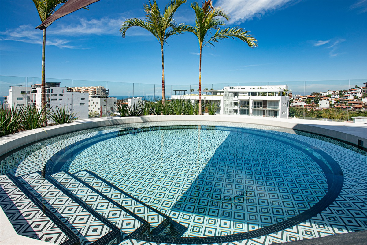 Relax in the largest hot tub in Puerto Vallarta while gazing out over the sparkling Bay of Banderas.
