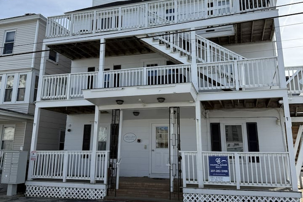 Front of building and the exterior stairs.  The easiest access and a door bell on the third floor for deliveries.
