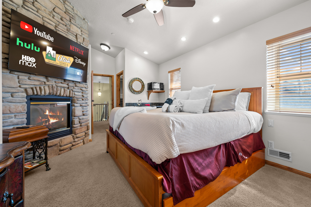 A Large TV, and Fireplace to enjoy. This bed also features a trundle bed underneath