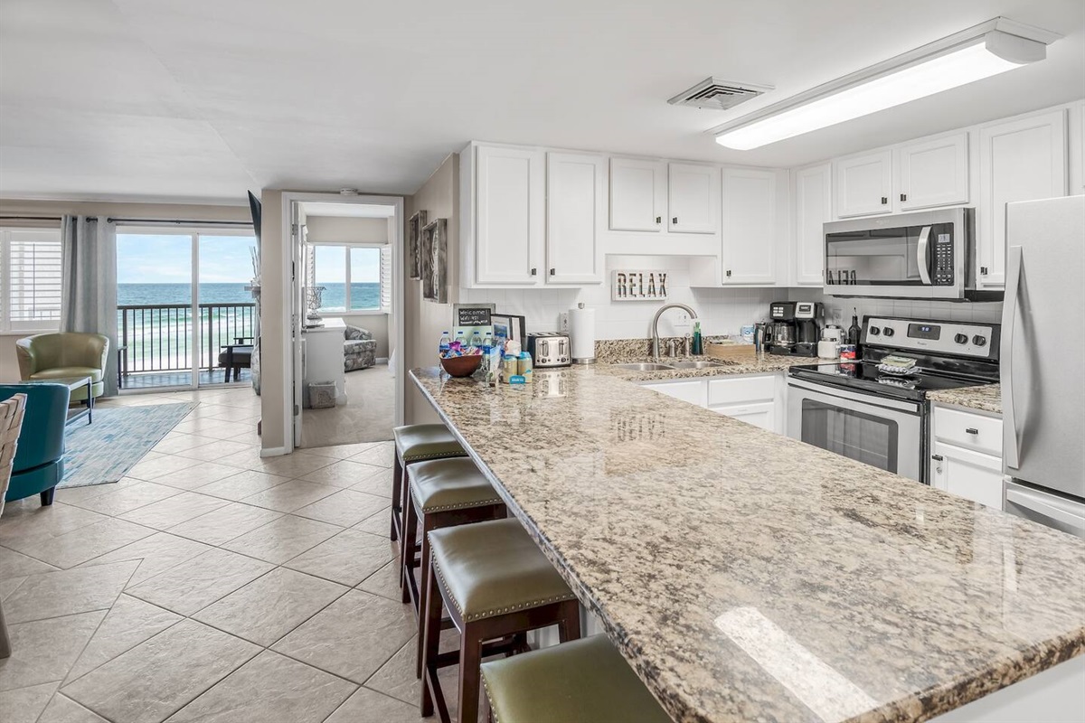 Recently remodeled kitchen is well stocked - cook Gulf front meals in your home away from home!