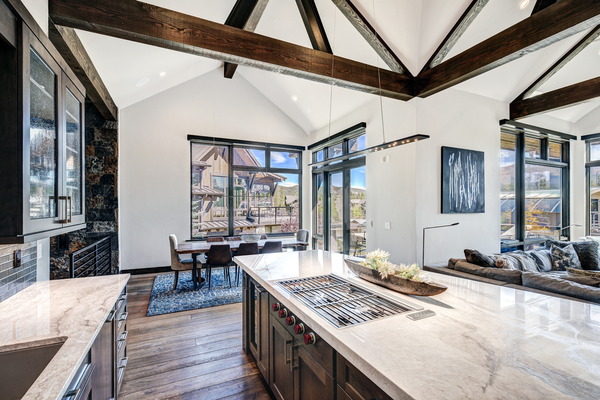 Kitchen with open floor plan to dining room and living room.