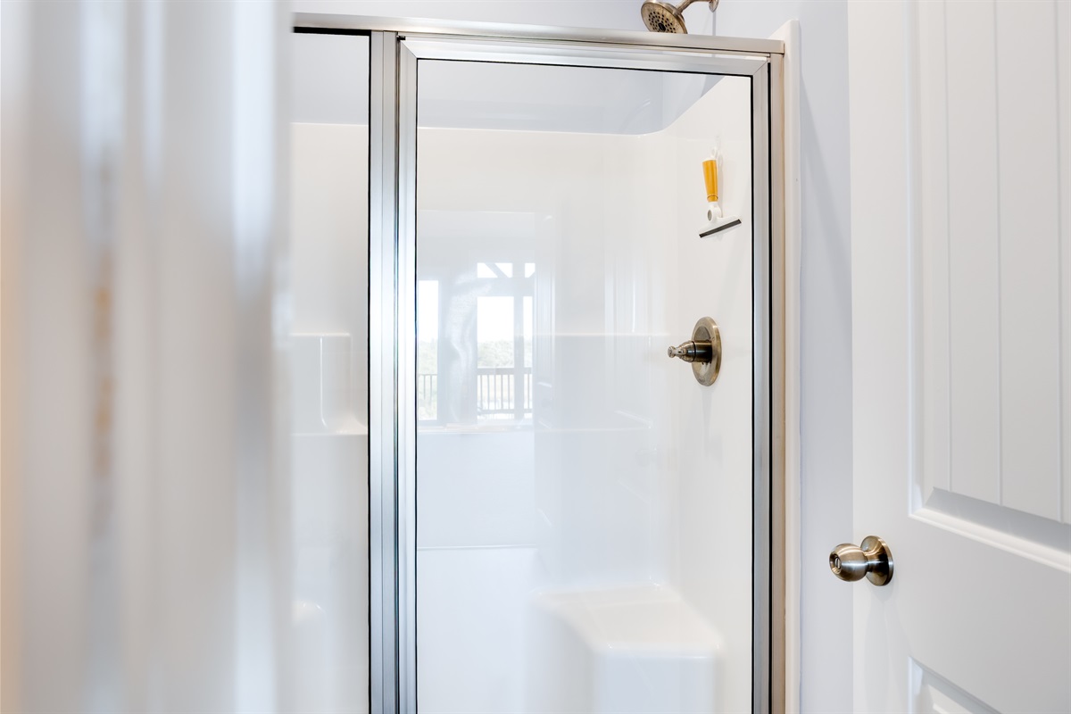 Walk-in shower in Master bathroom, with glass doors for a fresh, modern feel