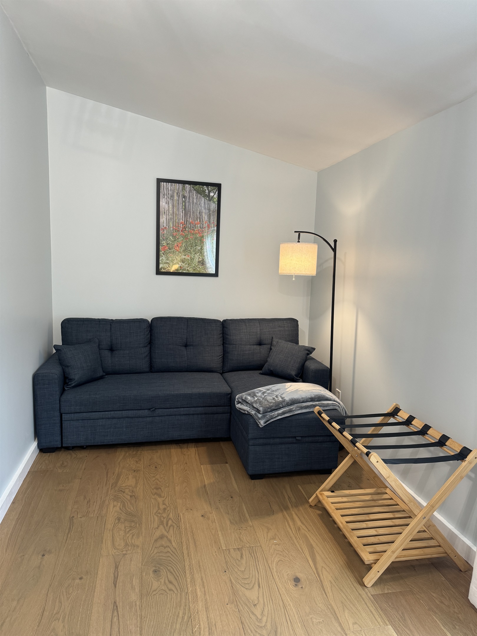 Primary Queen bedroom with desk and lounge area