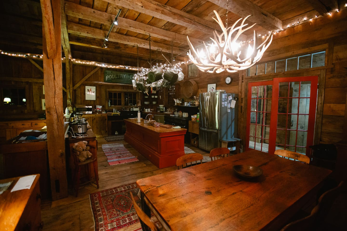 Little white lights and the mule deer chandelier cast a warm glow.