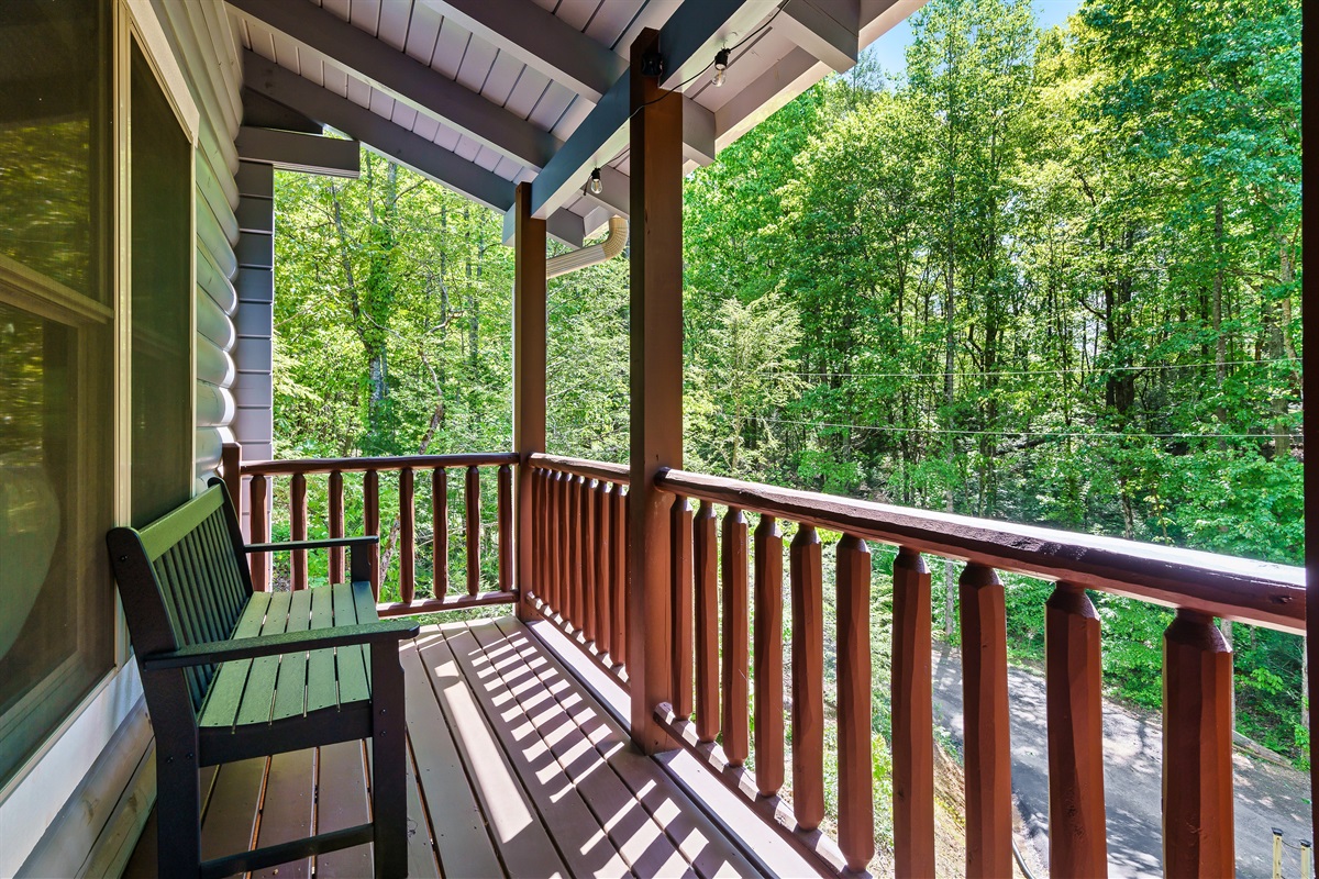Bench seating on one of the porch...take in the scenery.