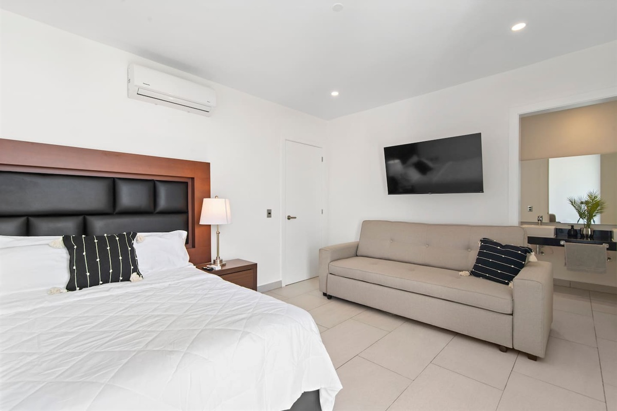 Master bedroom with pullout couch