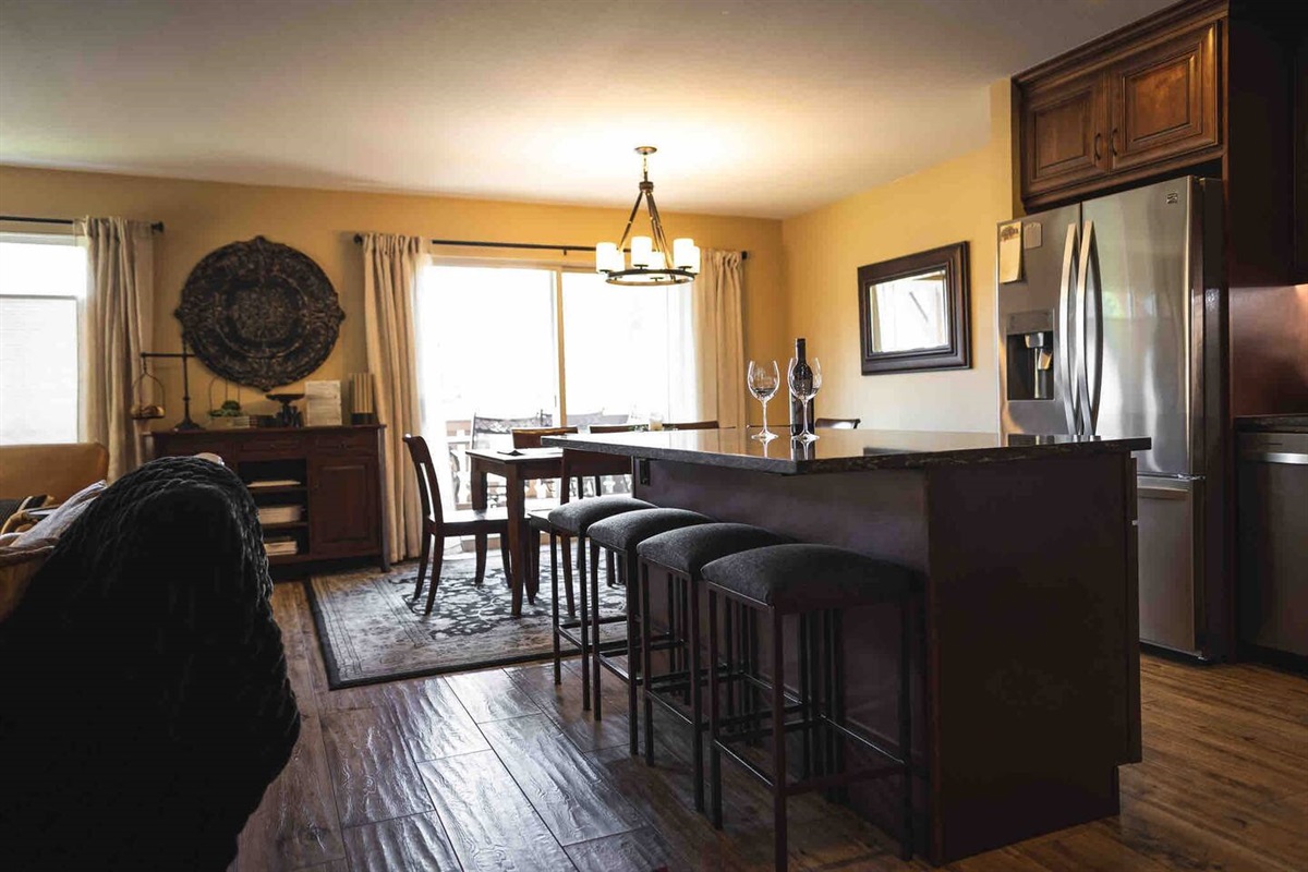 View from the kitchen to the dining room and deck