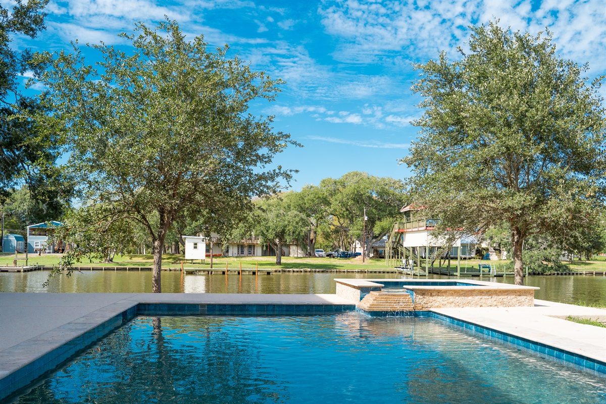 Gorgeous pool and hot tub overlooking Caney Creek
