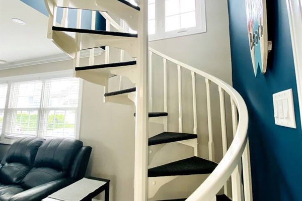 Spiral staircase to 2nd floor.