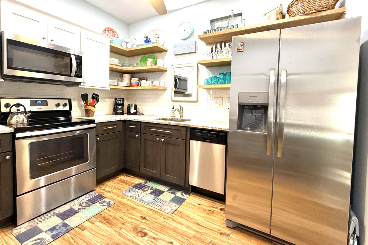 Kitchen with all essentials - pots, pans, dishes, utensils, bake ware...