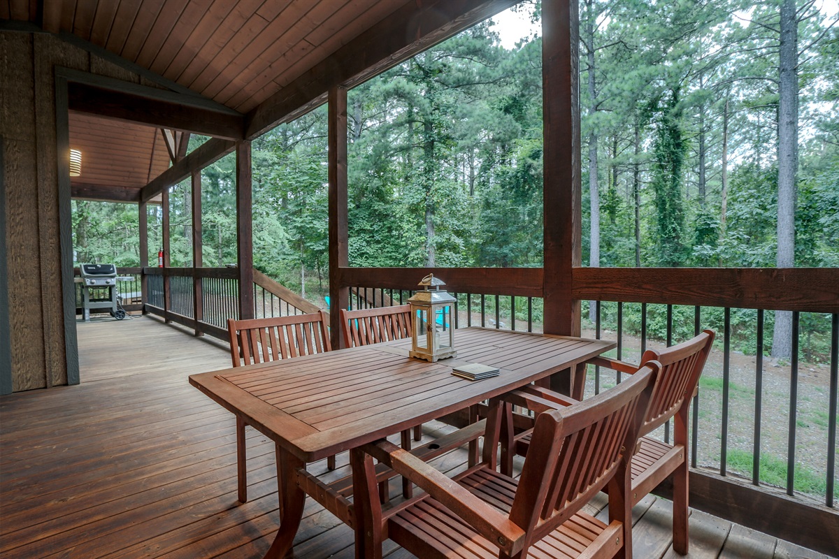 Ourdoor dining overlooking the forest