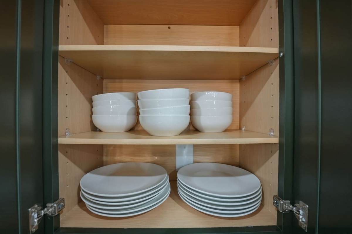 Plenty of dishware provided, including bowls and plates, making it easy to serve meals for everyone in your group.