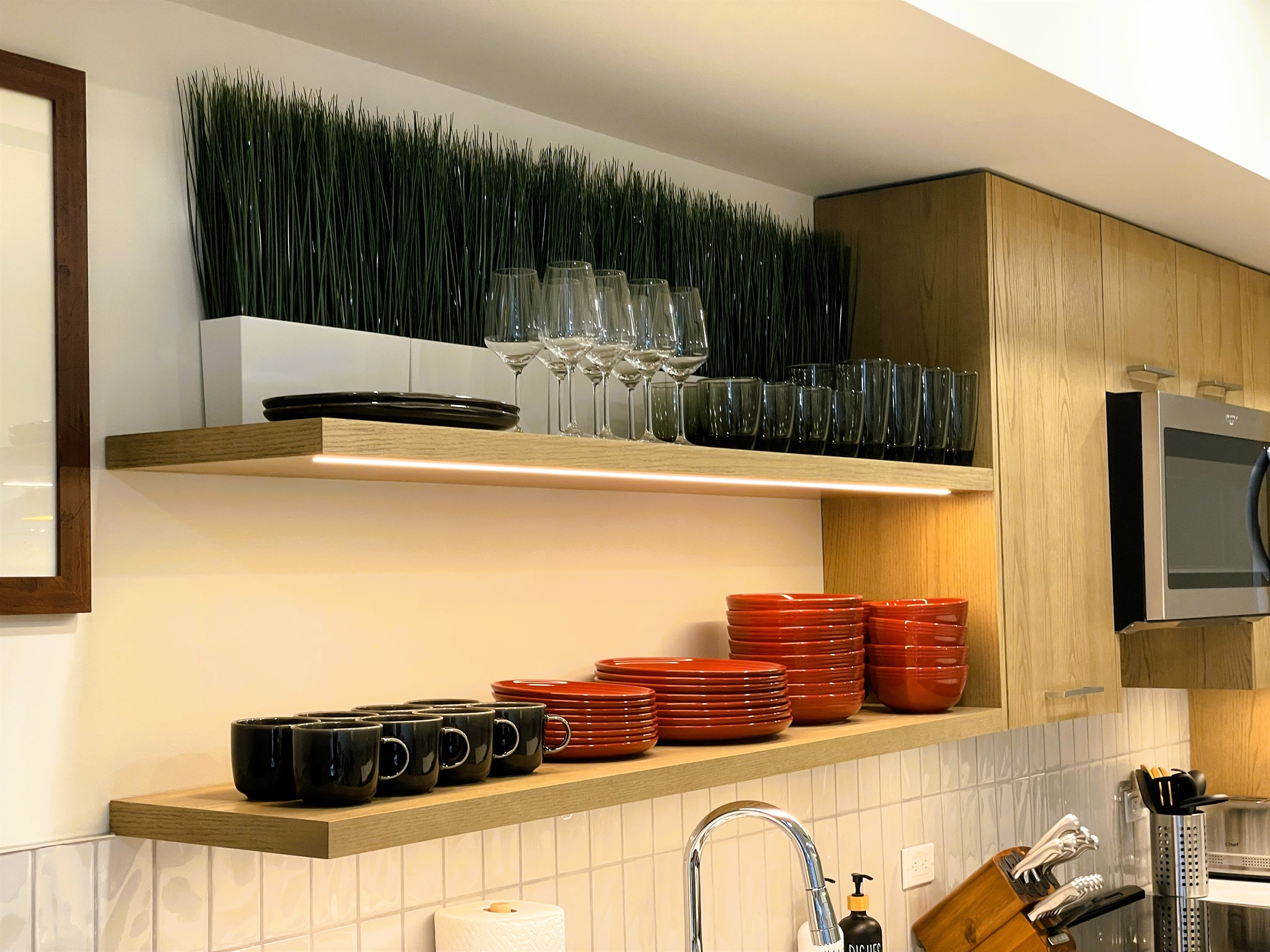 Well stocked kitchen, with pots and pans, dishes, cutlery, mugs, wine glasses, knife set, and much more to help you prepare meals in house on the days when you're not going out. 