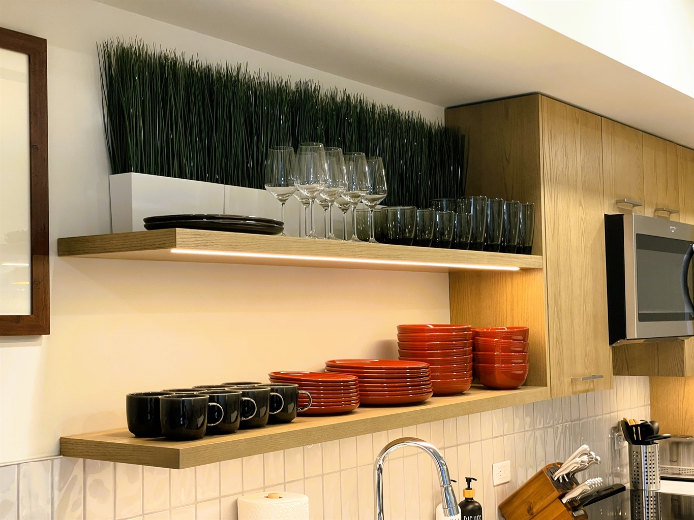 Well stocked kitchen, with pots and pans, dishes, cutlery, mugs, wine glasses, knife set, and much more to help you prepare meals in house on the days when you're not going out. 