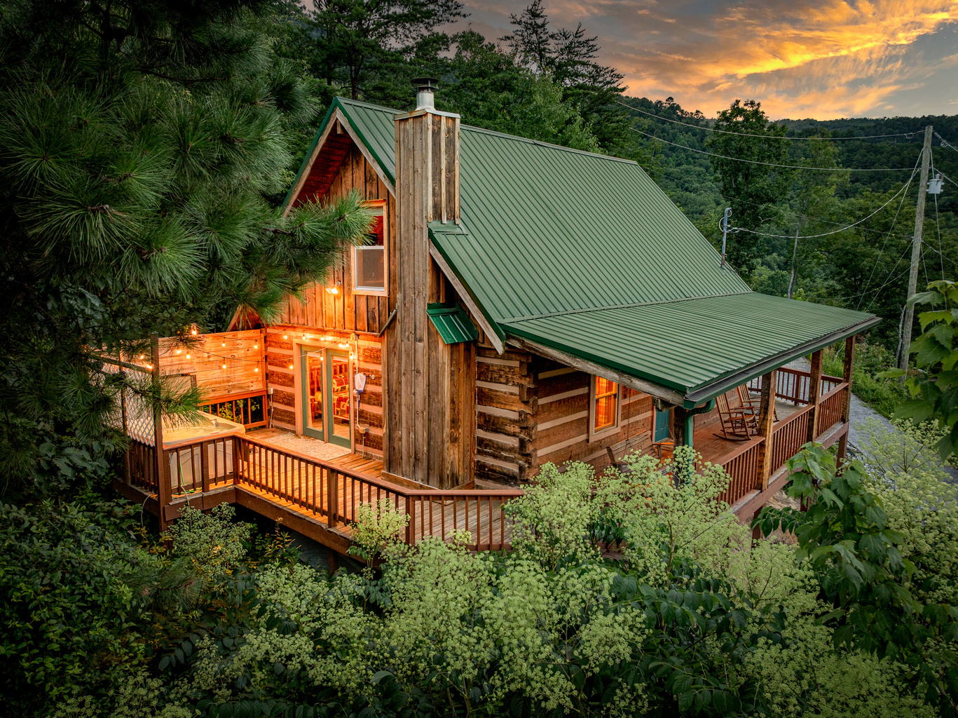 The cabin glows beautifully as the sun goes down