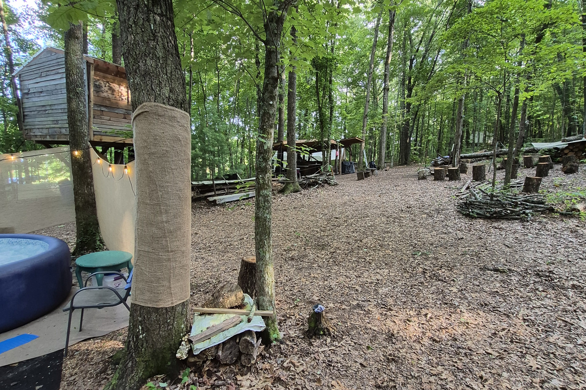Here you can see the Treehouse Shower and Outdoor Kitchen in the background