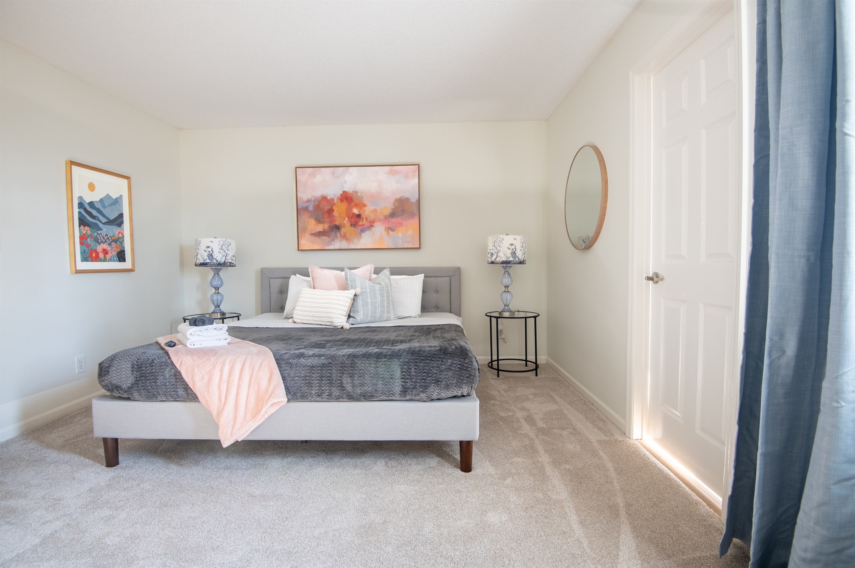 Another great view of the thoughtfully designed, serene king bedroom with an open, relaxed feel just off the dining room.