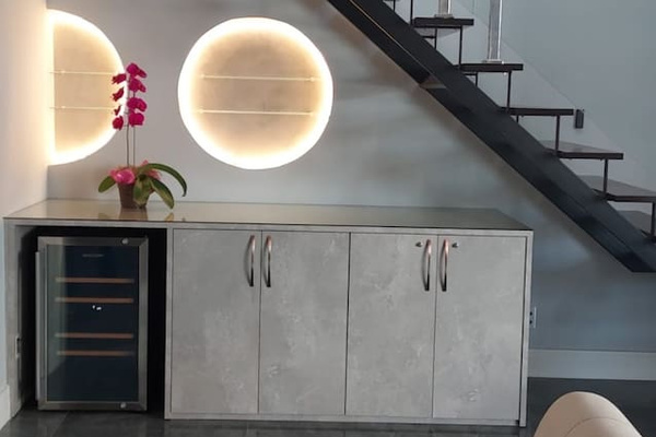 LED lighting accents many of the spaces, including this wine area, bathrooms, sauna, terrace, and more!