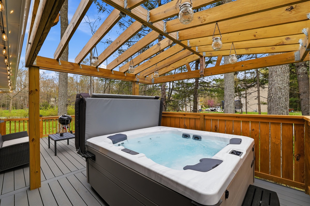 Unwind under the stars in our private, covered hot tub! The perfect spot to soak away the day.