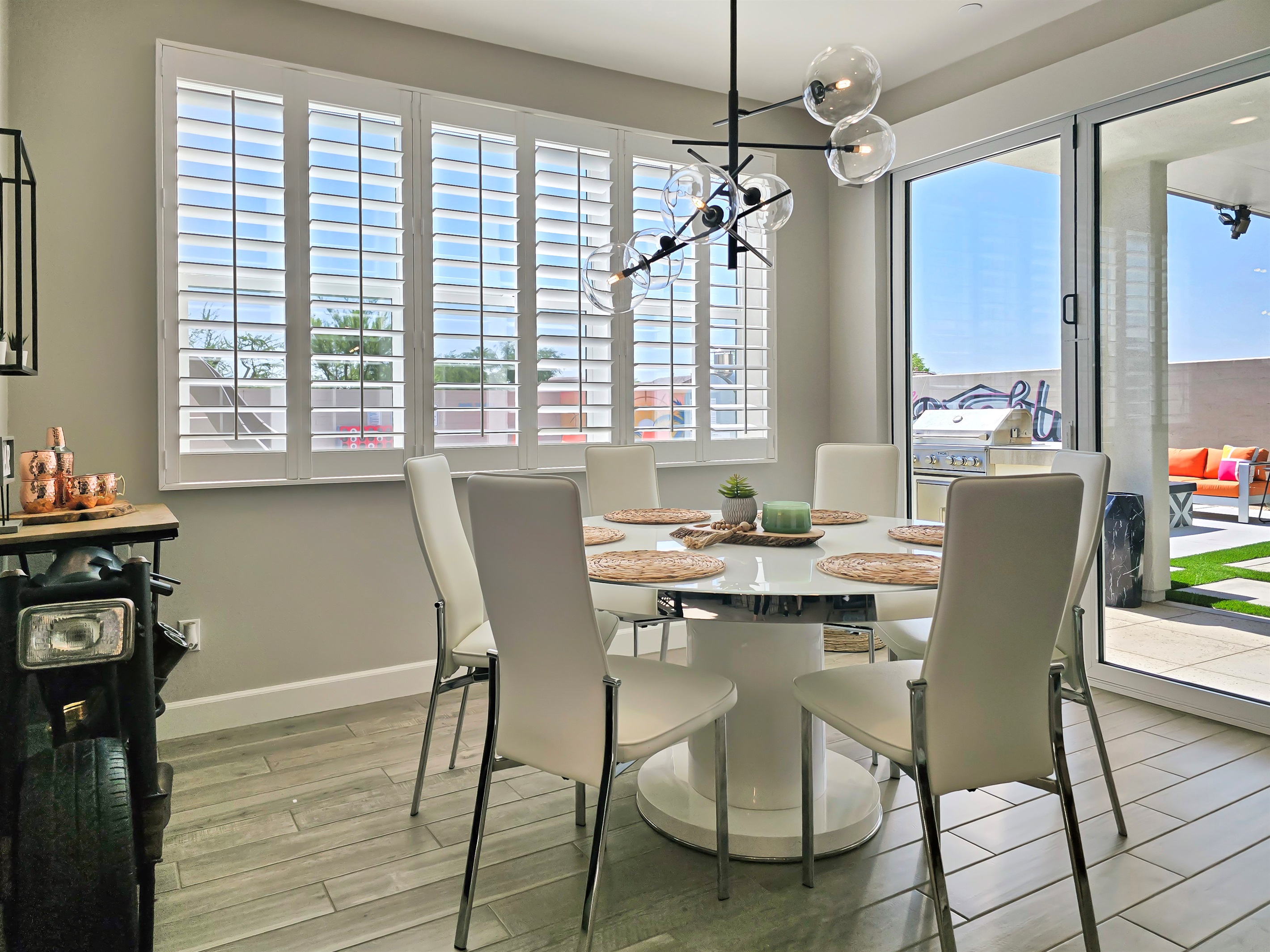 The dining room opens effortlessly to the backyard, creating a bright, sun-filled space perfect for indoor-outdoor living.