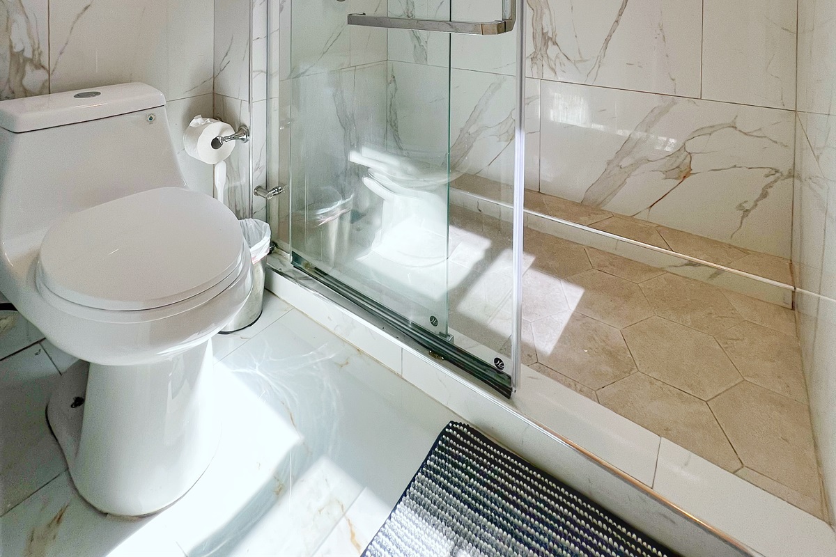 A sleek and modern bathroom designed with convenience in mind.