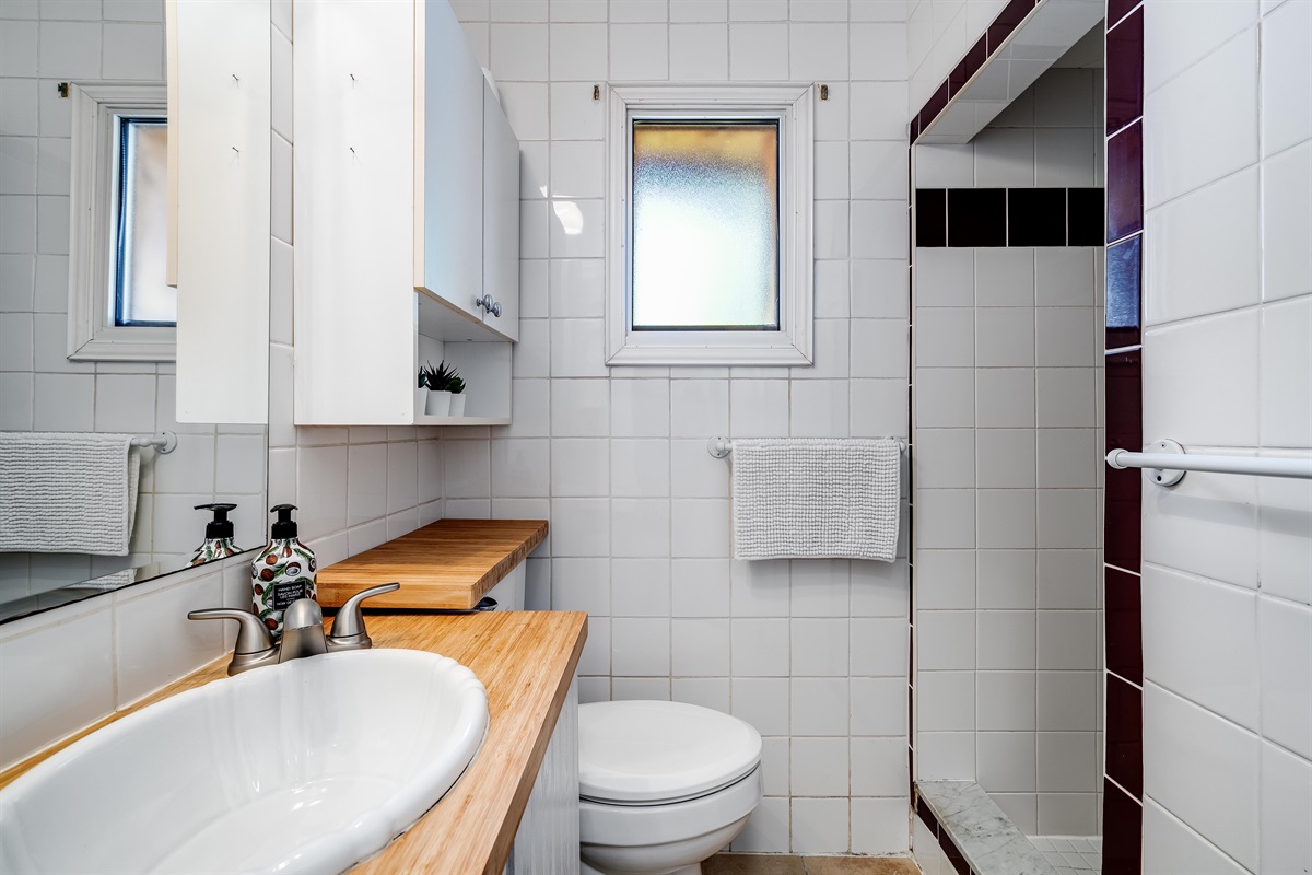 A bathroom that glistens with hotel-inspired luxury.