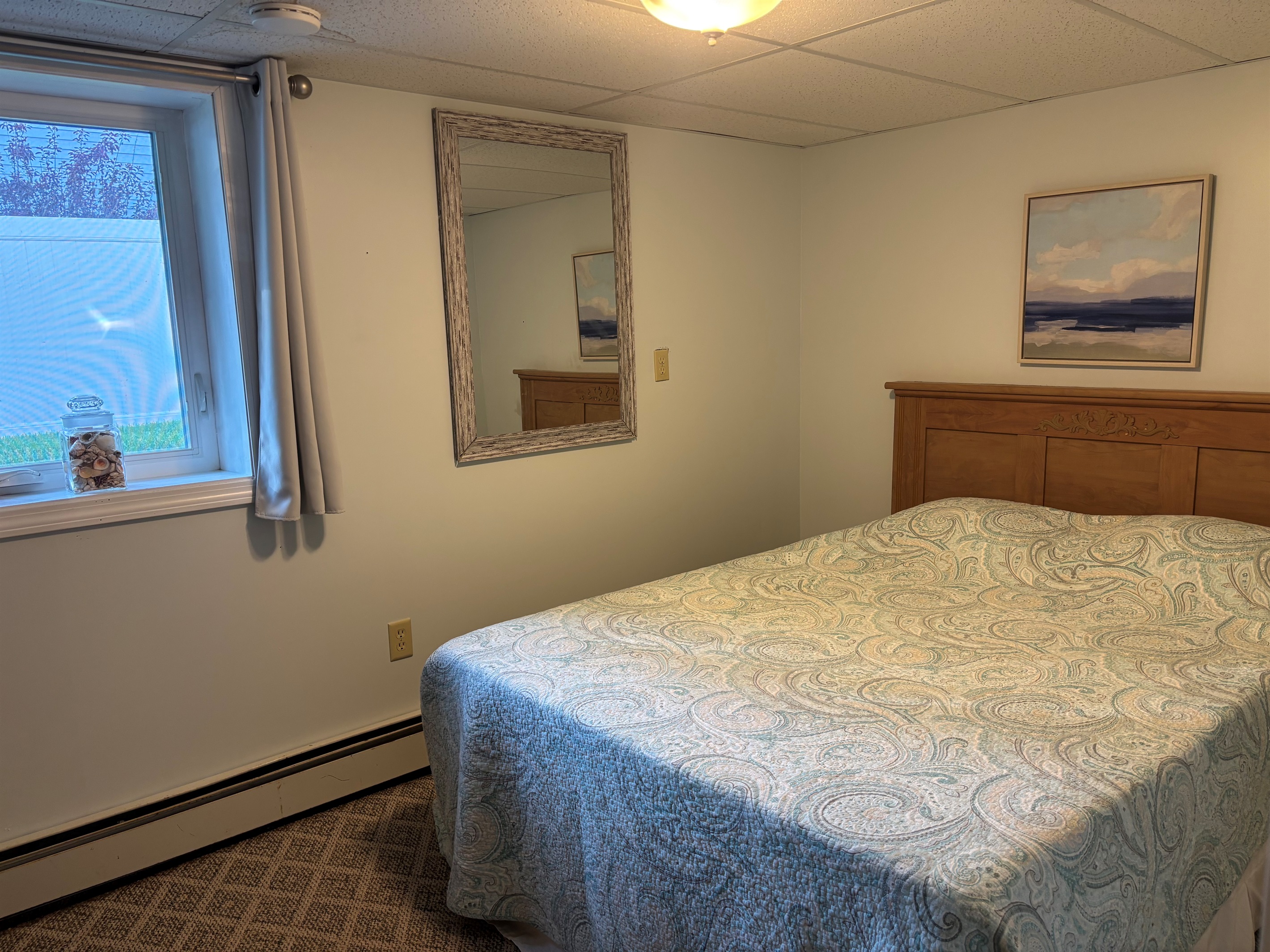 Queen bedroom in finished basement