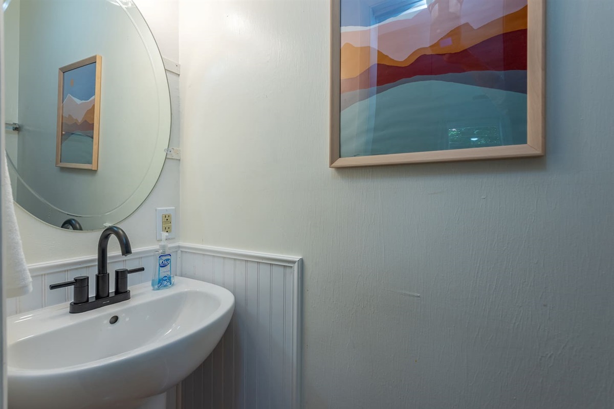 Cute extra clean 1/2 bath in Bedroom 2 -Front street side cleaned toilet & sink w hand antibacterial soap