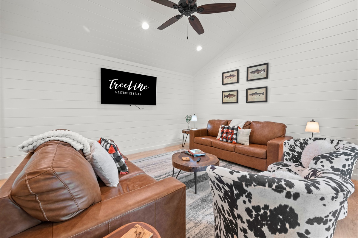 Comfortable lounge area with flat-screen TV.