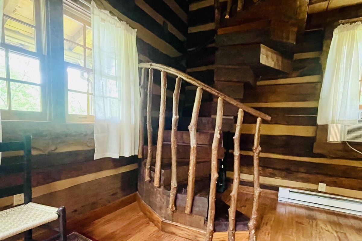 The spiral stairs to the loft area (where bed is located) are made of laurel.