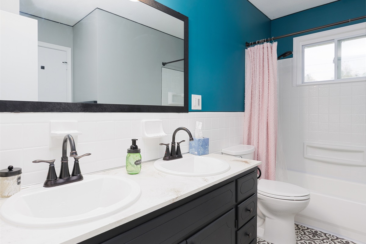 Bathroom vanity with storage and counter space for everyday convenience.