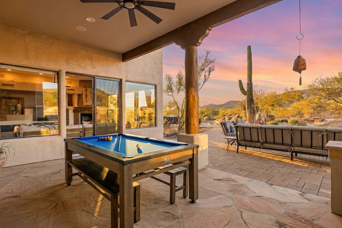 The multi funtion table on our covered patio area will give you hours of use and enjoyment for your group.