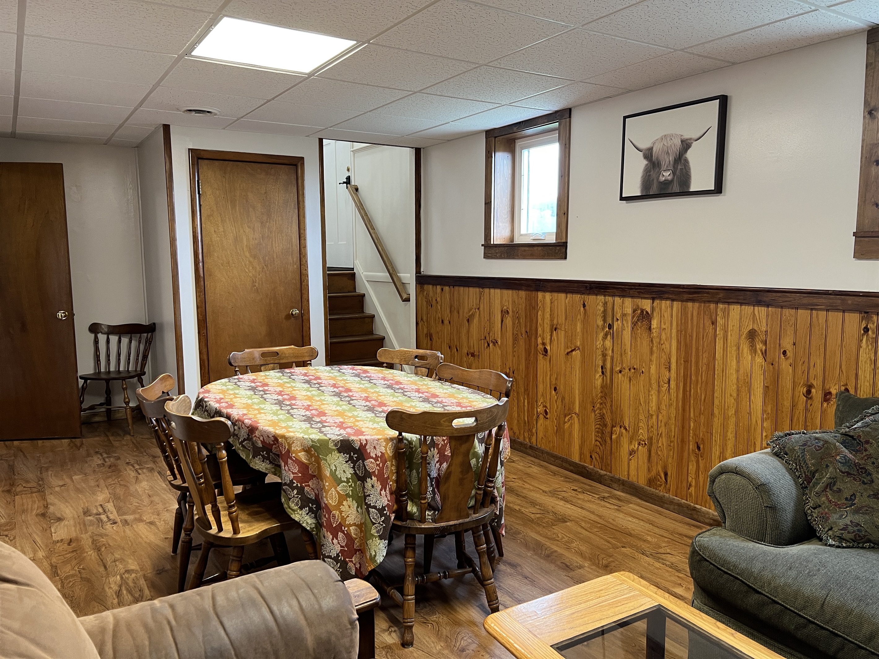 Lower level table and chairs to seat 6.