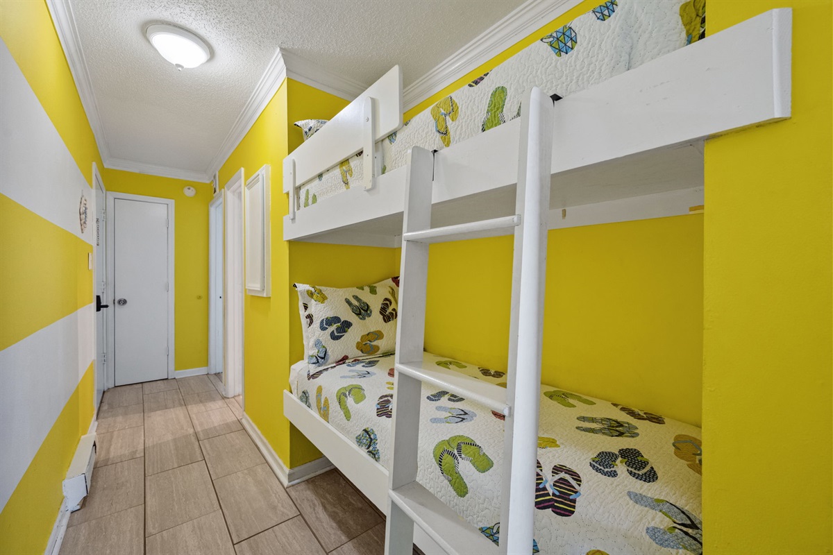 Built-in twin bunk beds tucked into the hallway&mdash;perfect for kids or extra guests