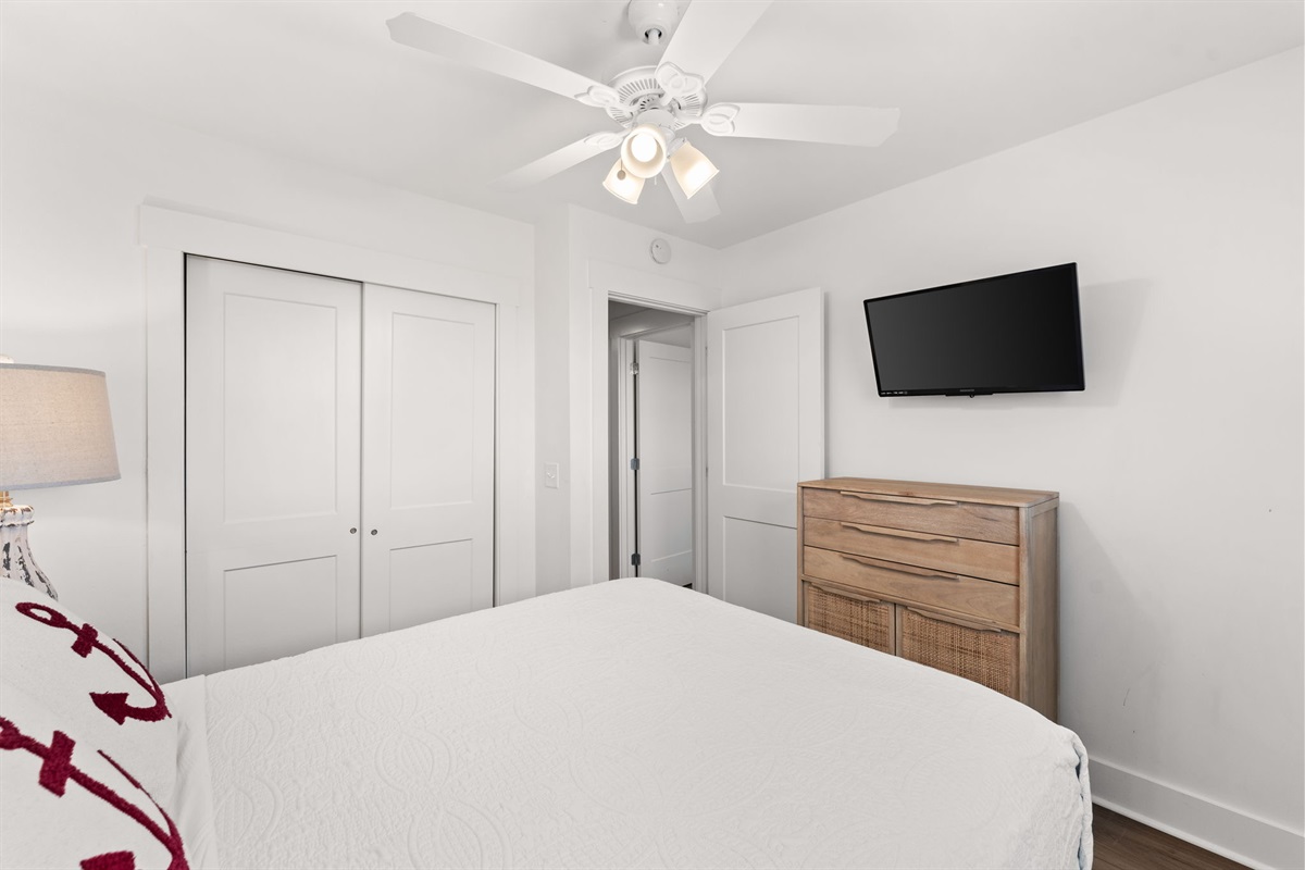 Side A, 3rd Floor: A peaceful guest room with a plush King bed and smart TV.