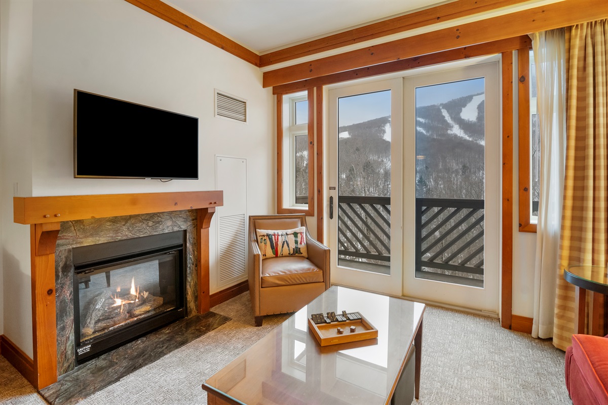 Get cozy by the fireplace after experiencing all the fun at Spruce Peak Village