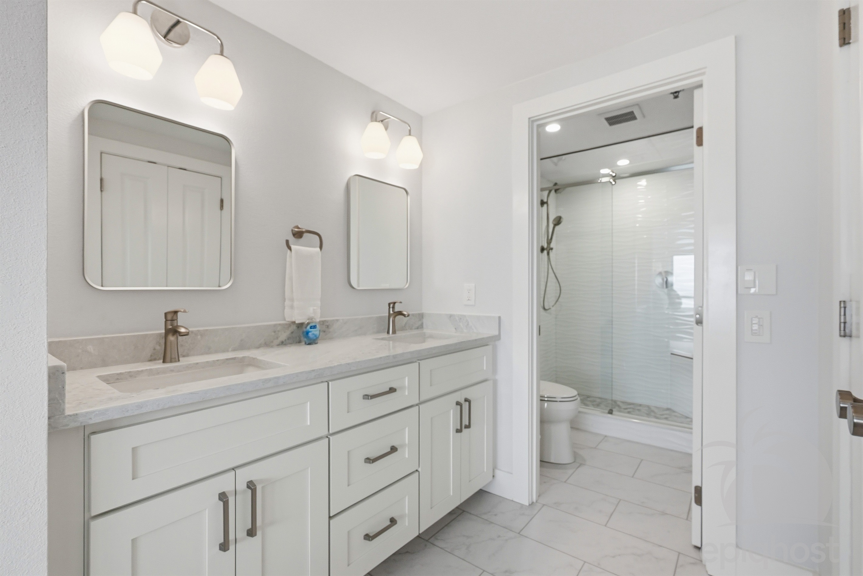 Master bath with walk-in shower and double vanity