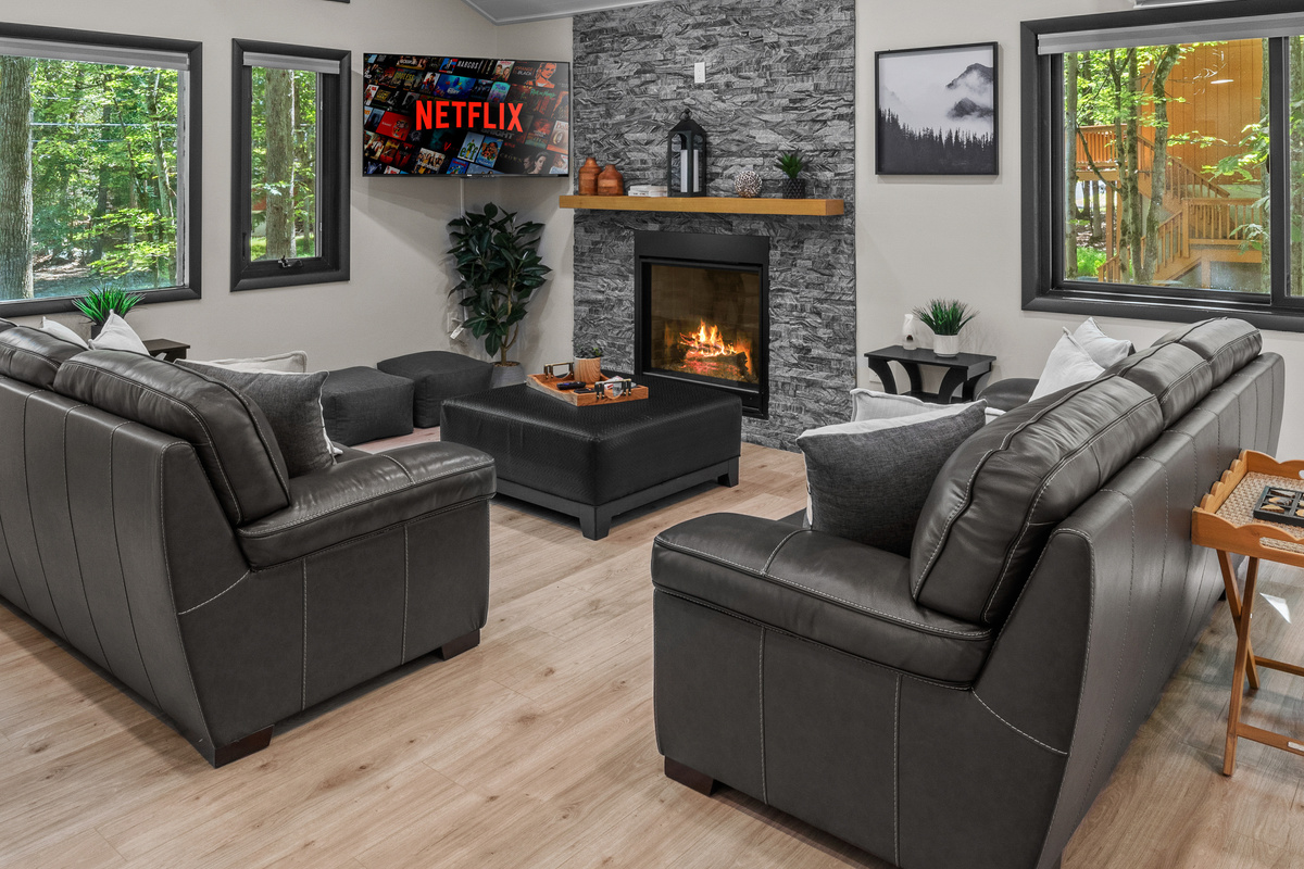 Step into the family room to relax, unplug, and soak in the quiet nature views from the large windows