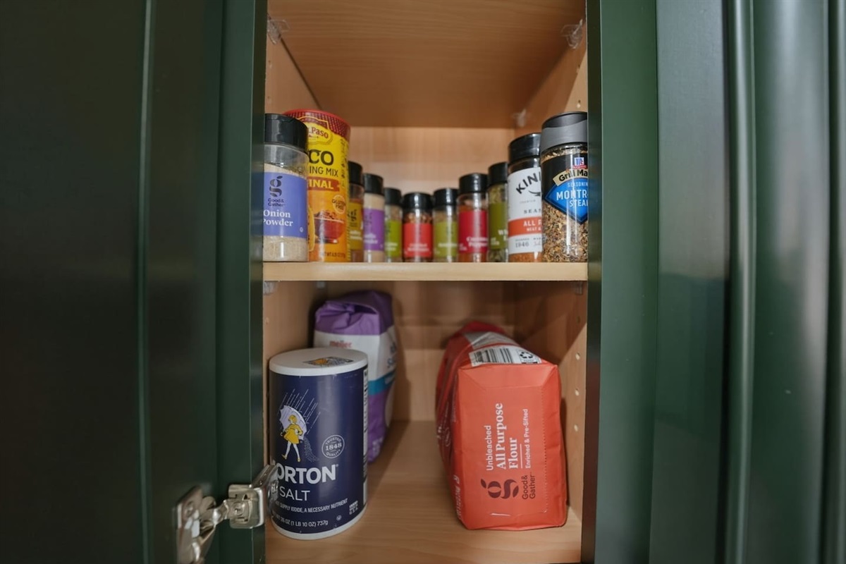 Fully stocked spice cabinet with common seasonings so you can cook your favorite meals with ease.