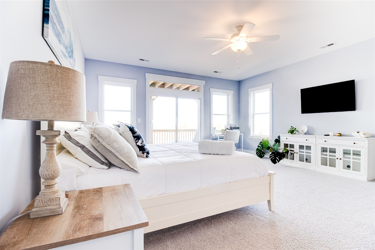 Enjoy a cozy sitting area and smart TV&mdash;perfect for quiet mornings or winding down in the evening