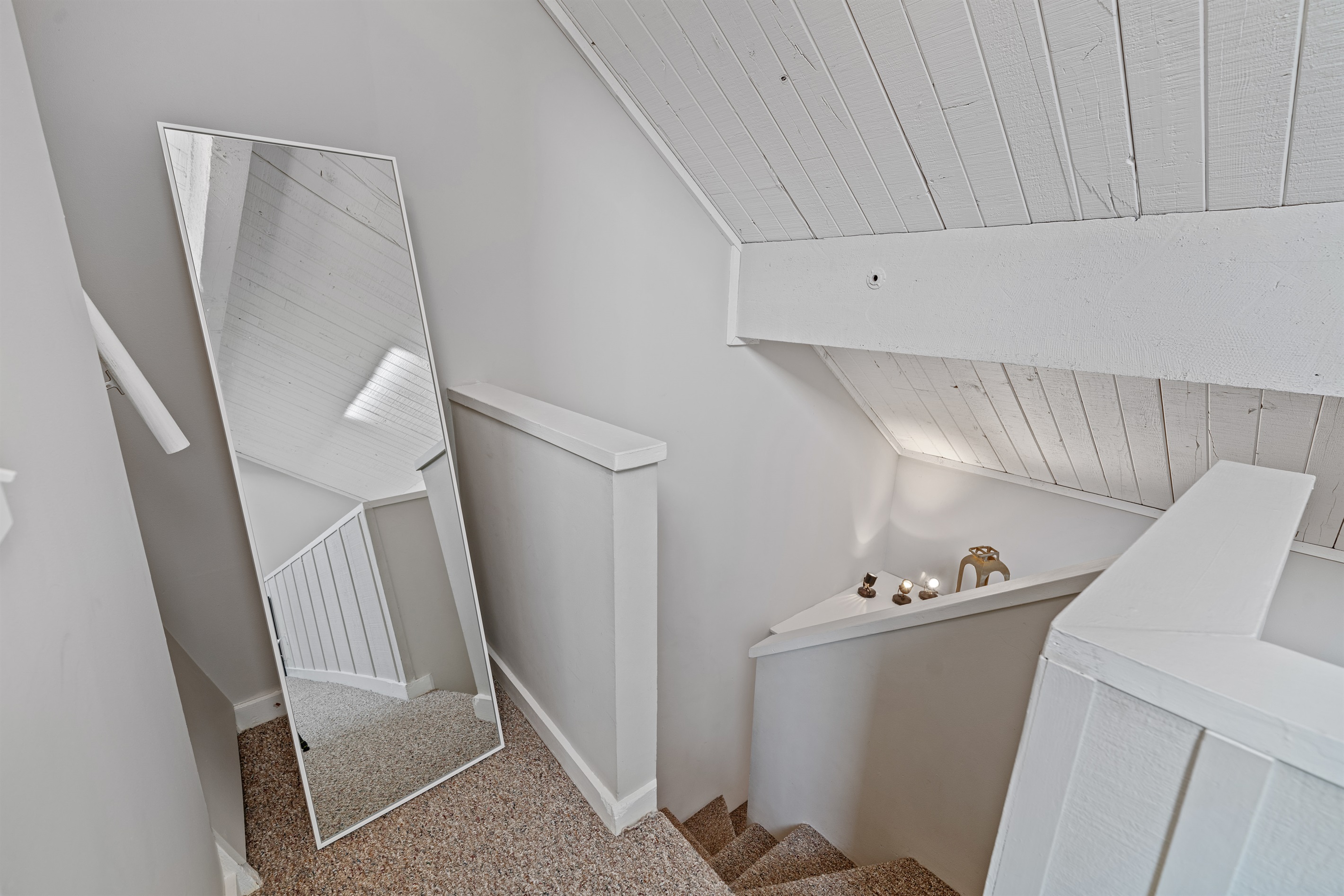 You will find a full- size mirror in the upstairs loft