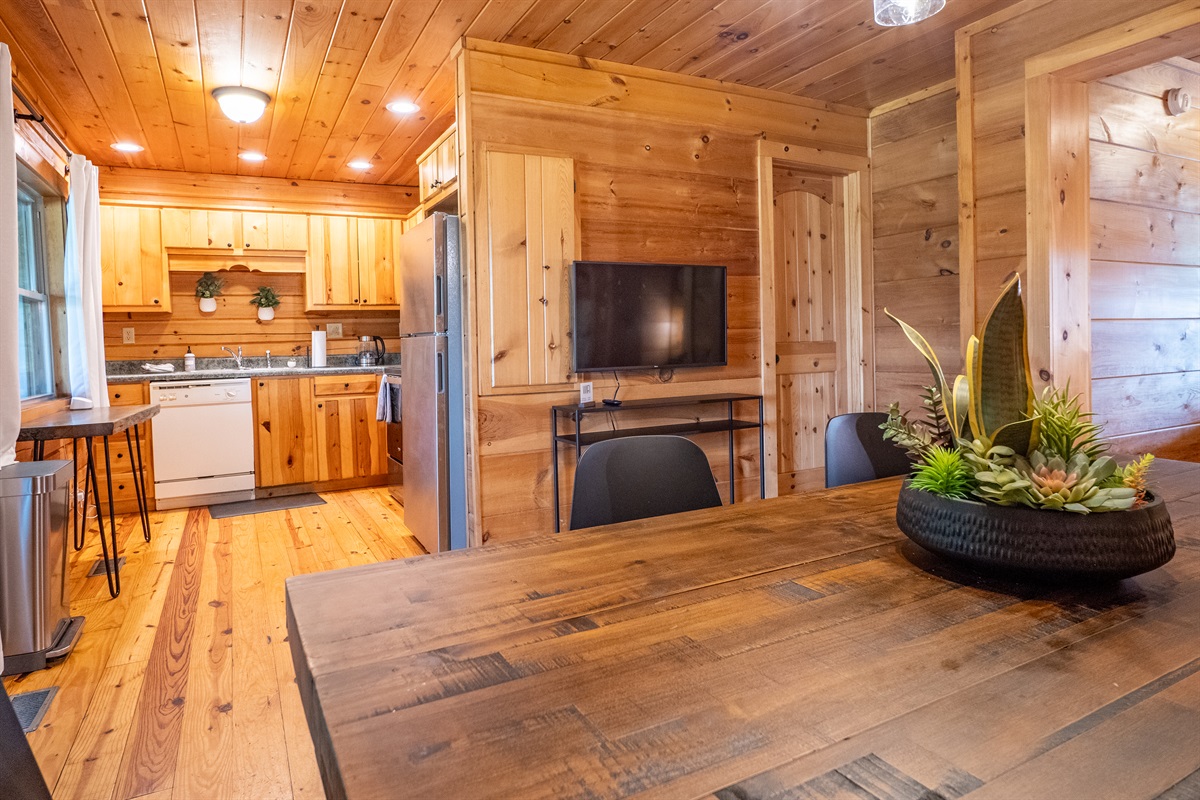 Enjoy seamless flow between the fully equipped kitchen and inviting dining area, making meal prep and entertaining a breeze.
