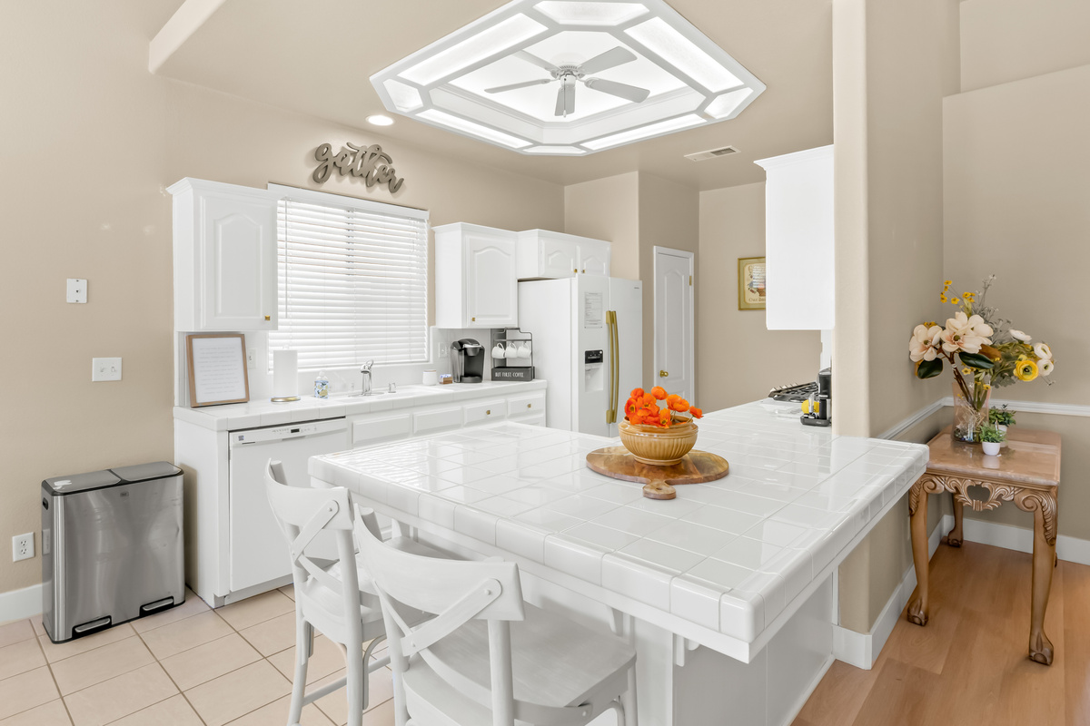 "The fully equipped kitchen offers plenty of space to cook, gather, and connect. Enjoy casual breakfasts at the oversized island or prepare family meals while staying part of the conversation in the open living areas.