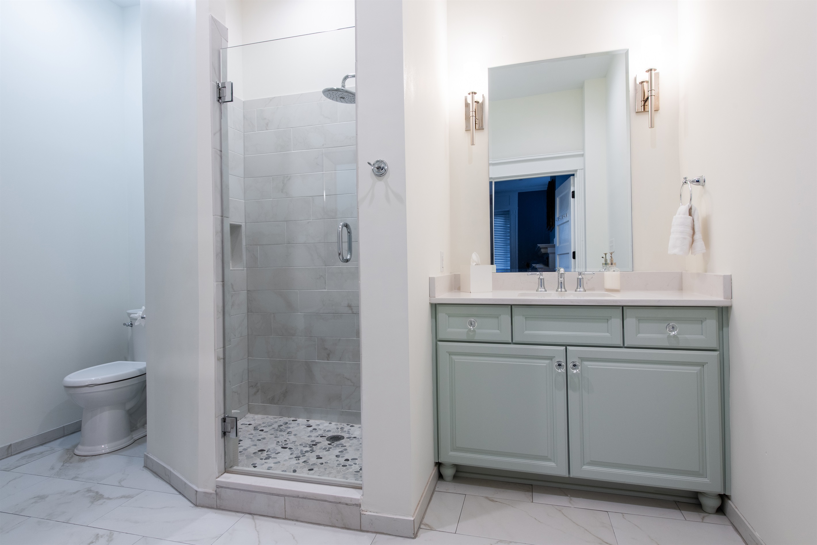 Bathroom 1- Ensuite Primary Bathroom, Walk in Shower, Walk in Closet.  Body Wash/Shampoo/Conditioner Provided Along With Luxury Towels.
