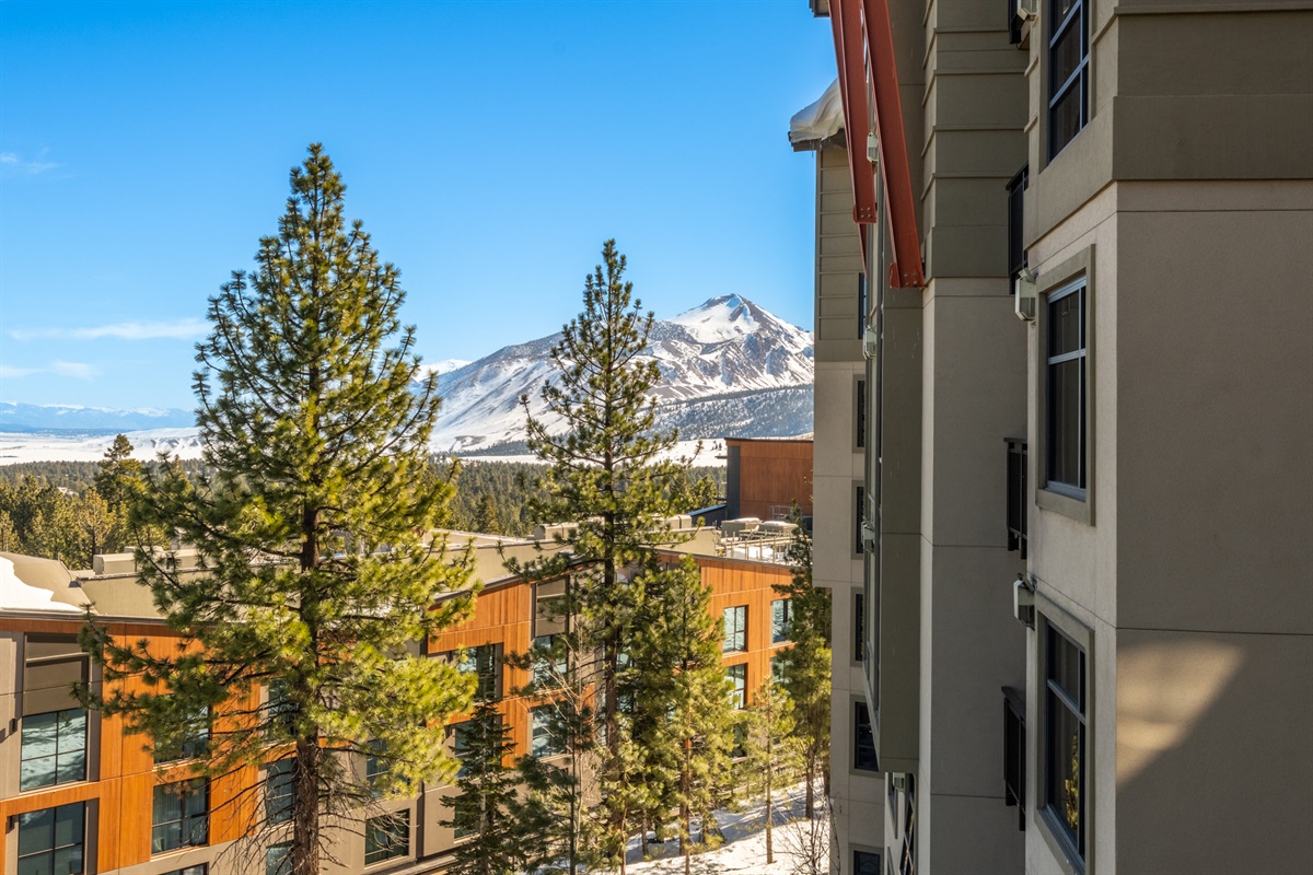 The bedroom, living room, and balcony also offer down-valley views that stretch toward Crowley Lake, the airport, and the Sherwin and White Mountains, offering a wide-open perspective of the Eastern Sierra.