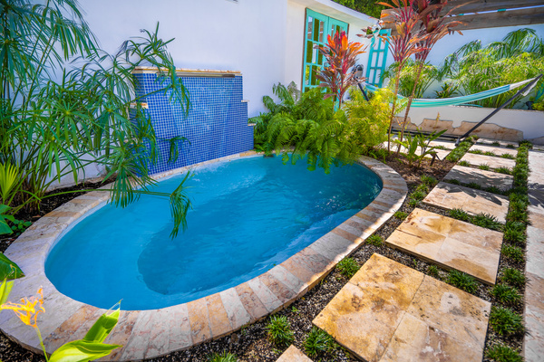 Indulge in the large salt water hot tub with wterfall after a day at the beach or rain forest in Dorado, Puerto Rico.