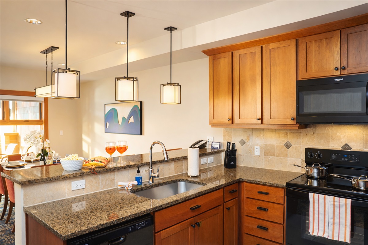 Bar area and open dining room. Dining table seats 6, bar area seats 3